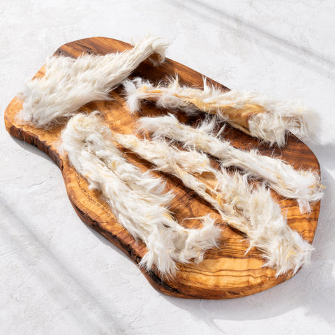 Bâtonnets en peau de lapin avec fourrure (10 cm) 